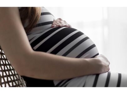 Pregnant woman sitting